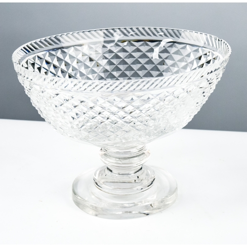 103 - HEAVY DIAMOND CUT GLASS BOAT-SHAPED TABLE CENTRE FRUIT BOWL, on short knopped stem, with circular so... 