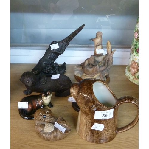 FOUR MODELS OF OTTERS, including: 'LARGE OTTER' model no: M18221