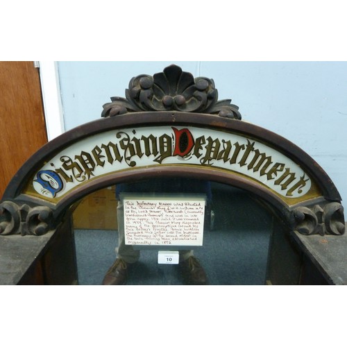 10 - LATE VICTORIAN CHEMIST SHOP DISPLAY CASE, the recessed arched top mirror inset section enamelled and... 