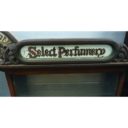 10 - LATE VICTORIAN CHEMIST SHOP DISPLAY CASE, the recessed arched top mirror inset section enamelled and... 