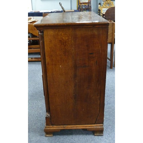 78 - GEORGE III OAK AND MAHOGANY CROSSBANDED CHEST OF DRAWERS, the oblong top above two short and three l... 