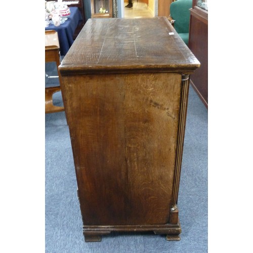 78 - GEORGE III OAK AND MAHOGANY CROSSBANDED CHEST OF DRAWERS, the oblong top above two short and three l... 