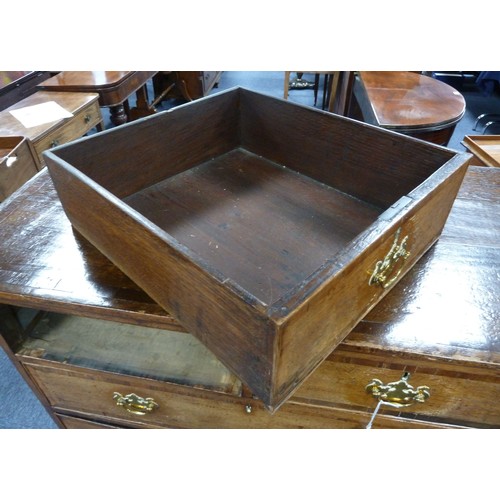 78 - GEORGE III OAK AND MAHOGANY CROSSBANDED CHEST OF DRAWERS, the oblong top above two short and three l... 