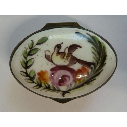27 - 18TH CENTURY OVAL ENAMEL PATCH BOX painted in colours with flowers between laurel and fern fronds, o... 