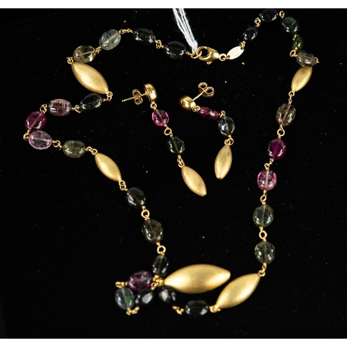 162 - SUITE OF DESIGNER JEWELLERY IN SILVER FRAMED MOTHER OF PEARL AND EACH PIECE SET WITH A SHAPED TOURMA... 