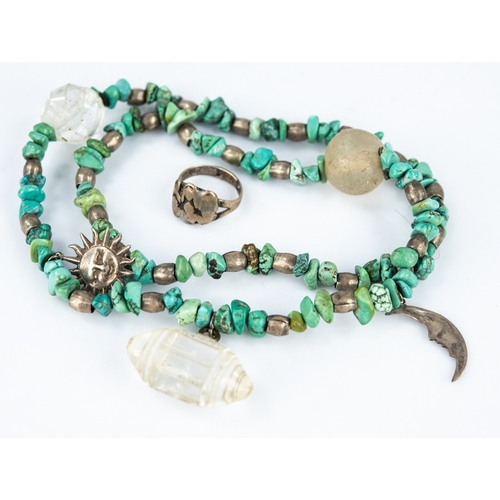 161 - VINTAGE NECKLACE of chip turquoise beads with white metal spacers and with sun and moon white metal ... 