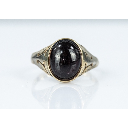 160 - 9ct GOLD RING collet set with a cabochon garnet, ring size 'Q/R', 2.9gms