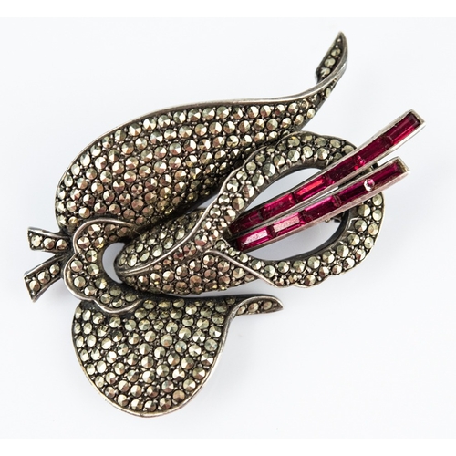 154 - GOOD QUALITY 925 MARK SILVER AND MARCASITE IRIS FLOWER BROOCH issuing two fronds set with pink bague... 