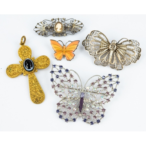 149 - GOLD PLATED METAL CROSS PENDANT with filigree applied front collet set with an oval cabochon banded ... 
