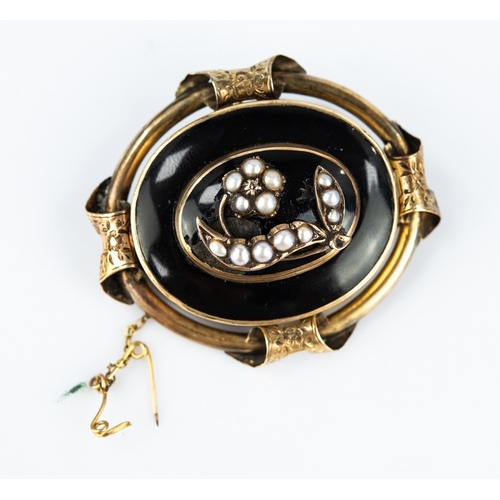 141 - VICTORIAN LARGE OVAL MOURNING BROOCH with glazed intricately woven hair locket back, the domed oval ... 