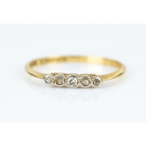 135 - 18ct GOLD AND PLATINUM RING set with a row of five small brilliant cut diamonds, 1.8gms, ring size '... 