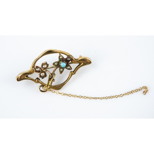132 - EDWARDIAN 9ct GOLD ART NOUVEAU BROOCH with a turquoise and seed pearls in floral and foliate setting... 