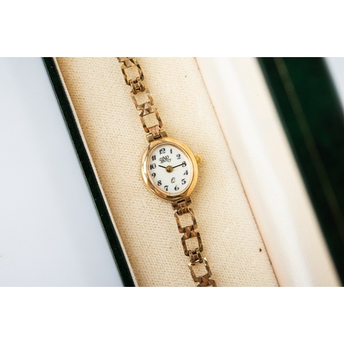 23 - LADY'S UNO SWISS 9ct GOLD BRACELET WATCH with quartz movement, small white circular Arabic dial, the... 