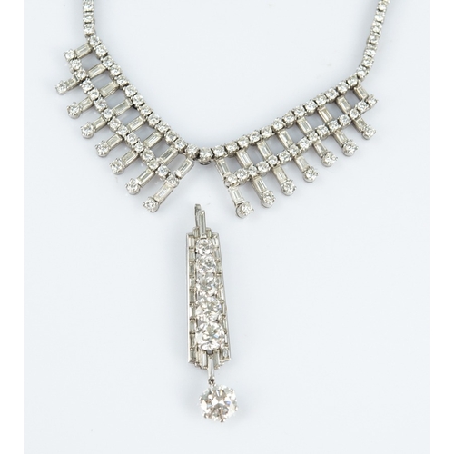 119 - ART DECO PLATINUM AND DIAMOND NECKLACE, the chain back with each link claw set with a small round br... 
