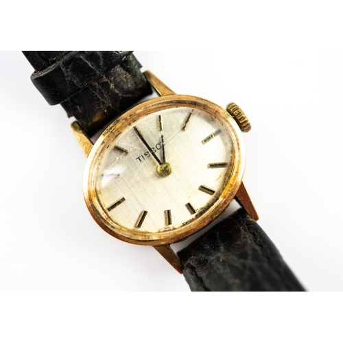 21 - LADY'S TISSOT 9ct GOLD WRIST WATCH, with mechanical movement, circular silvered dial with batons, 2c... 