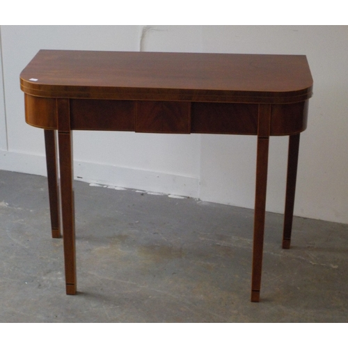62 - AN EARLY NINETEENTH CENTURY INLAID MAHOGANY FOLD-OVER TEA TABLE
