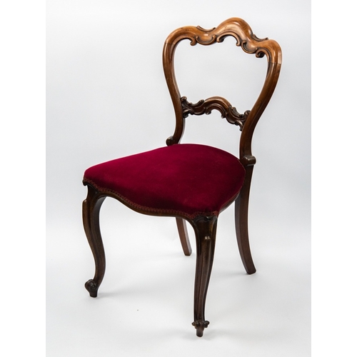 86 - SET OF FOUR VICTORIAN CARVED ROSEWOOD SINGLE DINING CHAIRS, each with scroll carved and arched top r... 