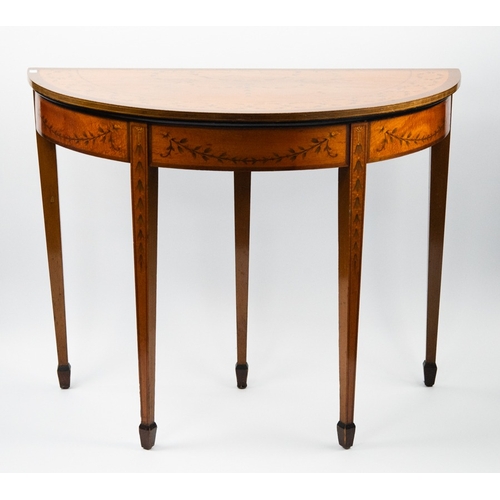69 - GEORGE III PAINTED SATINWOOD DEMI-LUNE CARD TABLE, the crossbanded, fold-over top with pull-out leg ... 