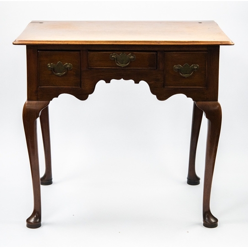 67 - EIGHTEENTH CENTURY WALNUT LOWBOY, the moulded oblong top above three cockbeaded drawers around the k... 