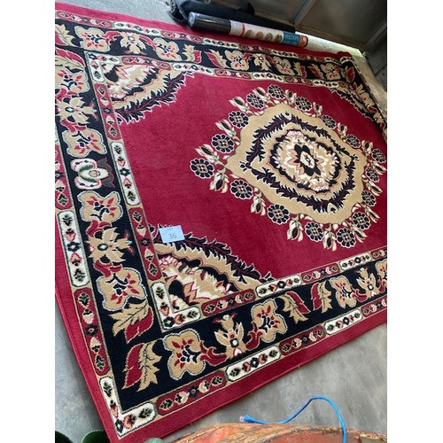 36 - Red patterned rug