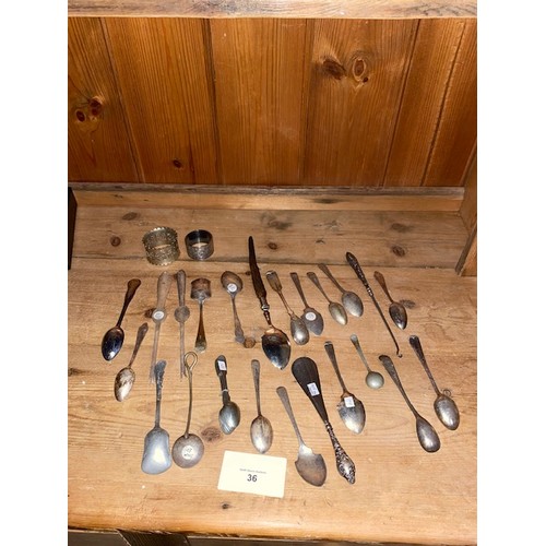 36 - Collection of spoons & 2 x napkin rings (some silver plated)