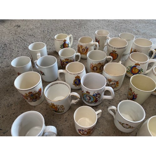 100 - Large collection of china mugs, cups commemorating the royal family