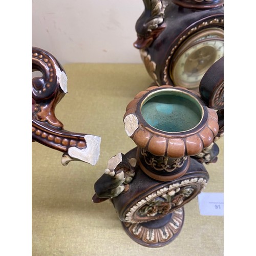 91 - Majolica clock garniture of Dolphin handed clock & vases - Damage to one of the handles and the bott... 