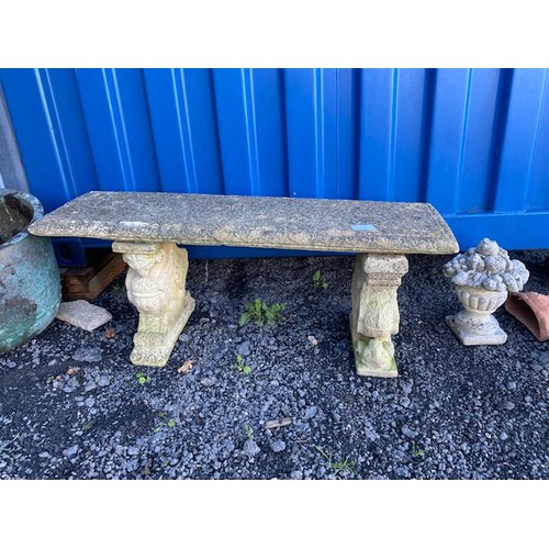 213 - A stone composite garden seat - raised on two pedestals - Section OSC