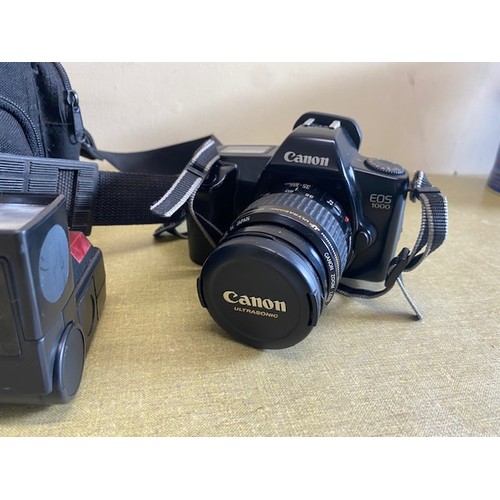 215 - Canon EOS 1000 Camera with bag and accessories - Section O12