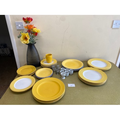 317 - Assortment of yellow plates, egg cups and mug - Section S8