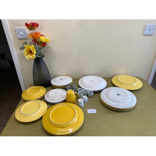 317 - Assortment of yellow plates, egg cups and mug - Section S8