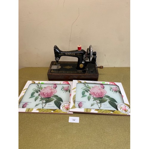 356 - Singer Sewing Machine and two cutting mats - Section S3