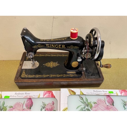 356 - Singer Sewing Machine and two cutting mats - Section S3