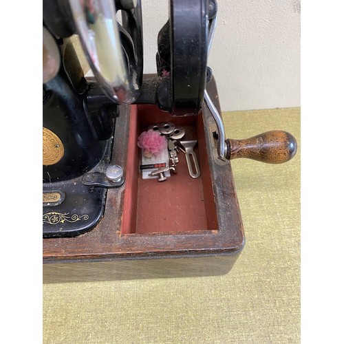 356 - Singer Sewing Machine and two cutting mats - Section S3