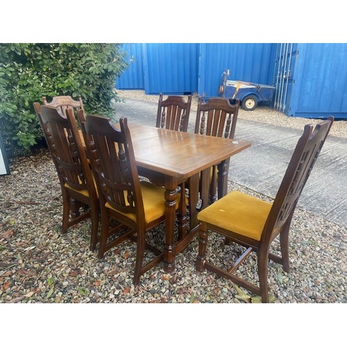 425 - Vintage Dining table with 6 Chairs 

PLEASE NOTE: after photographing the chair pads have been remov... 