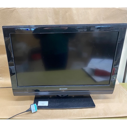 574 - Sharp TV with remote - Section S5