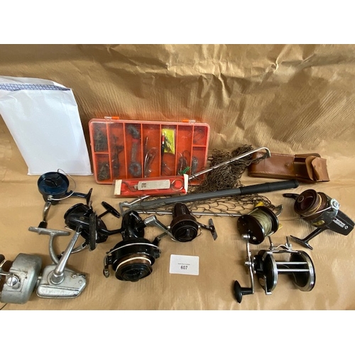 607 - Assorted fishing reels and tackle (with manuals) - Section O14