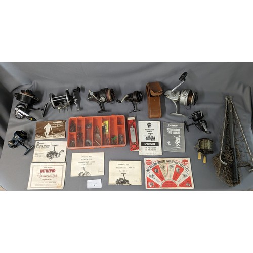 6 - Assorted fishing reels and tackle (with manuals)  - Viewing Section O11