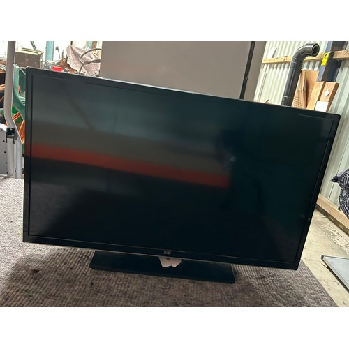 6 - JVC TV with 2 x remotes - Viewing section: S4