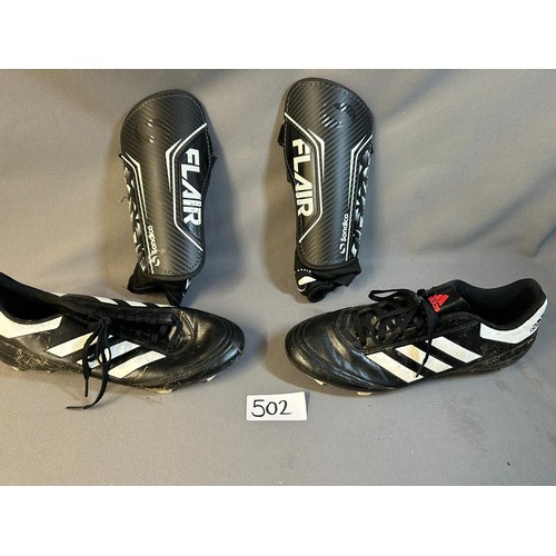 502 - Football boots - Size 8.5 & Shin Pads  - Viewing section: O26