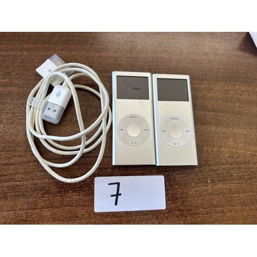 7 - 2x I pod shuffle - Haven't been tested not on charge charger wire included one with slight smudge on... 