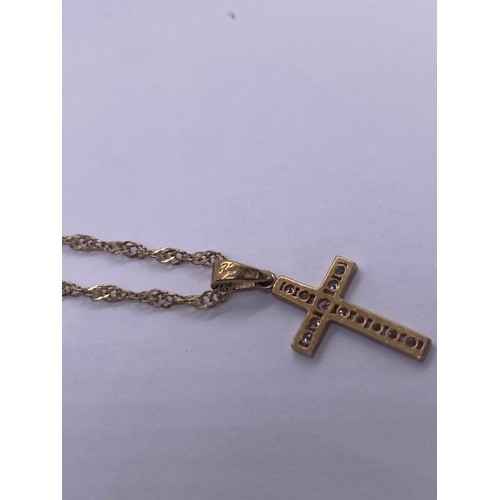 40 - 9ct Gold Cross Pendant with a 9ct gold chain - Viewing Section: O35