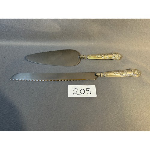 205 - Pair of sterling silver hallmarked cake servers (handle silver only) - Viewing Section: O1A