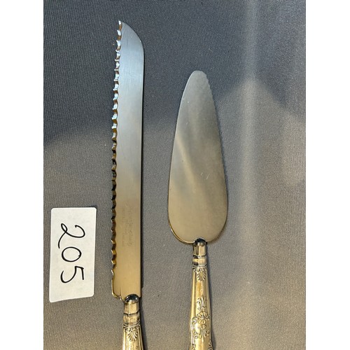 205 - Pair of sterling silver hallmarked cake servers (handle silver only) - Viewing Section: O1A