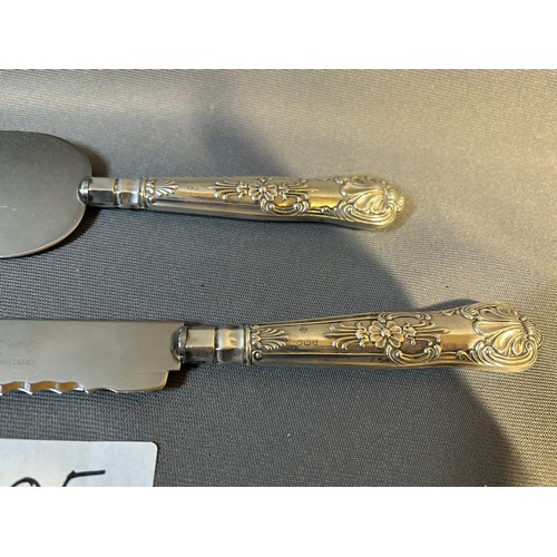 205 - Pair of sterling silver hallmarked cake servers (handle silver only) - Viewing Section: O1A