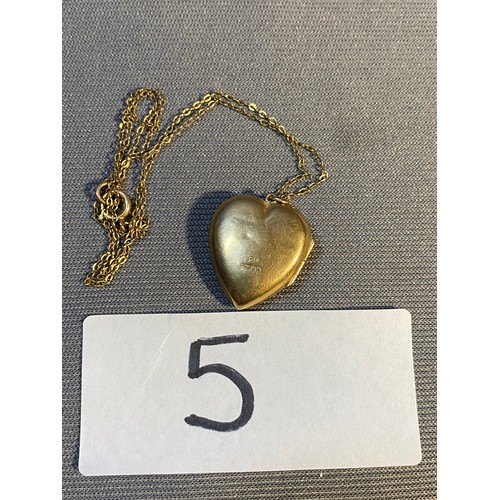 5 - 375 Gold locket & chain - Viewing Section: O47