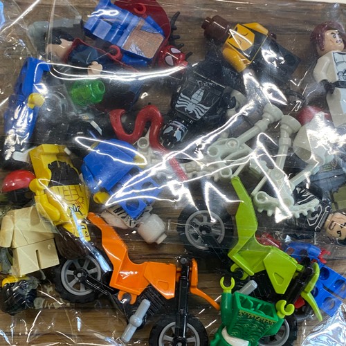 397 - Selection of toys including a pack of lego mini figures - Viewing section: O37