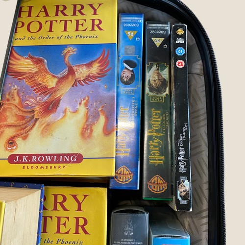 402 - Large suitcase full of Harry Potter Books, tapes etc - Viewing Section: O30