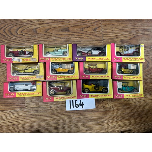 1164 - 12 x Vintage match box cars in box - Viewing section: O15