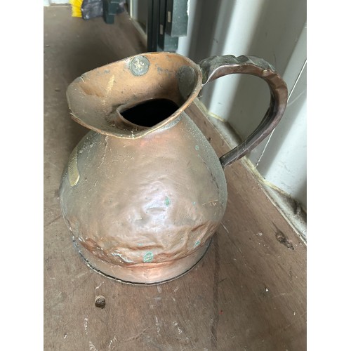 39 - 2 Gallon copper jug